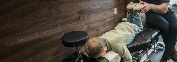 Chiropractor Exeter NH Marc Steiner Adjusting Patient2 Chiropractor Exeter NH Marc Steiner Adjusting Patient2