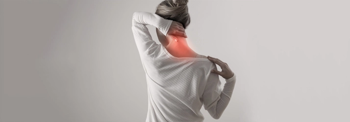Chiropractic Exeter NH Neck Pain A woman with neck pain.